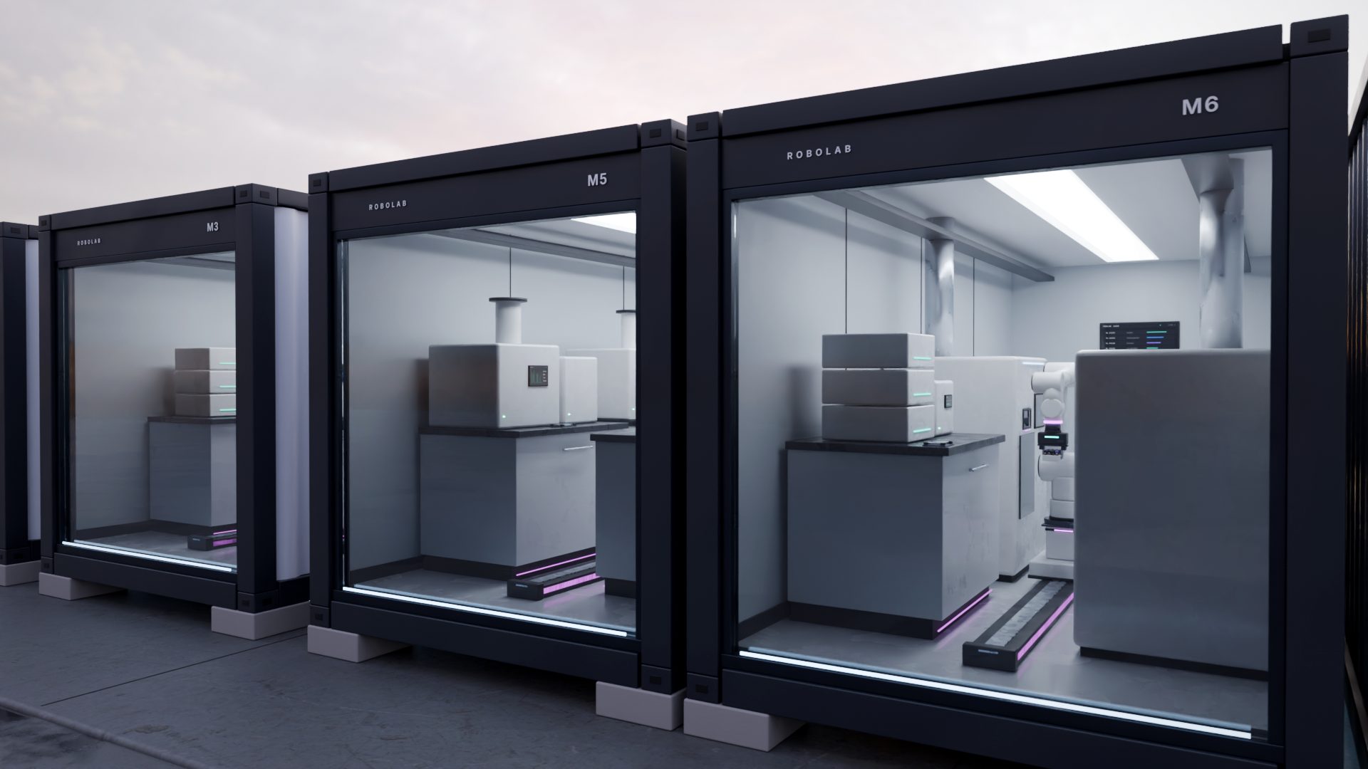 Robolab modules in a row on a concrete pad at dusk, with instruments and robot arms behind each glass end